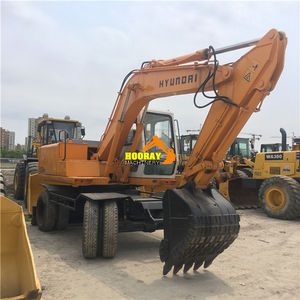 Excavatrice sur pneus de 13 tonnes Hyundai Robex 130W Excavatrice d'occasion avec lame hydraulique et ligne de marteau - Product Image 4