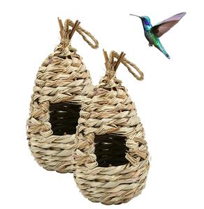 Cabane suspendue naturelle <span class=keywords><strong>en</strong></span> <span class=keywords><strong>forme</strong></span> <span class=keywords><strong>de</strong></span> <span class=keywords><strong>boule</strong></span> <span class=keywords><strong>d</strong></span>'herbe tissée à la main Cage <span class=keywords><strong>de</strong></span> <span class=keywords><strong>nid</strong></span> <span class=keywords><strong>de</strong></span> colibri Maisons <span class=keywords><strong>de</strong></span> colibri pour l'extérieur Jardin Patio Pelouse - Product Image 1