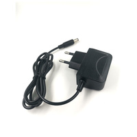 Enchufe DE LA UE 12V 1A Proveedor de energía de seguridad certificado Enchufe europeo 12W Conmutación STB Adaptador de corriente