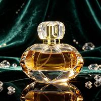 Nouveau design de luxe, flacon de parfum en verre transparent de 100 ml à coupe plate, avec pulvérisateur à pompe, capuchon en acrylique, design effet pierre précieuse, sérigraphie épaisse
