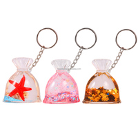 Porte-clés liquide en acrylique, mini sac porte-bonheur, avec flotteurs 3D (ours, pingouin, étoile de mer) et paillettes liquides colorées, personnalisable, cadeau