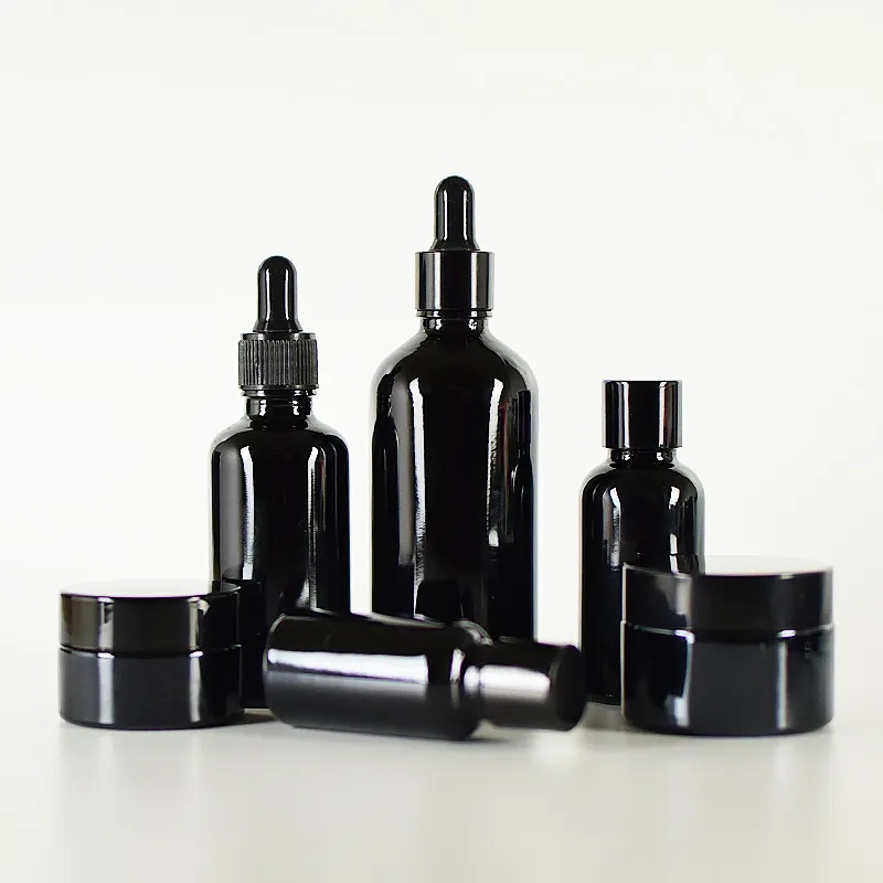 Pipeta cuentagotas trans de embalaje cosmético negro gota botella de botellas de cuentagotas de vidrio con embalaje