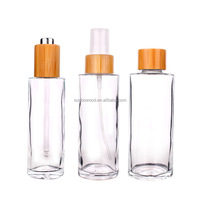 Botella personalizada tapa redonda de madera para perfume bola redonda de alta calidad tapa de madera fabricante de tapas de Bambú