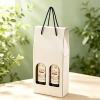 Boîte cadeau portable haut de gamme en carton recyclable avec logo personnalisé, estampage à chaud, gaufrage et lamination, pour deux bouteilles de vin rouge