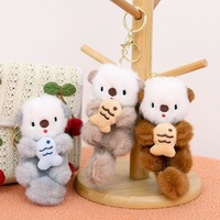 Nouveau adorable porte-clés en peluche loutre, jouet en peluche de dessin animé, mini loutre en peluche douce et mignonne, porte-clés, décoration de sac
