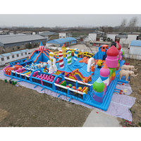 Grand parc aquatique gonflable en forme d'éléphant avec entrée double éléphant et parcours d'obstacles interactif pour les centres de divertissement aquatique