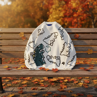 Pull-over unisexe personnalisé surdimensionné à motif dinosaure de dessin animé, tricoté à manches longues, design graphique décontracté sur le devant pour l'automne