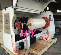 Machine automatique de découpe de ruban adhésif pour rouleaux de papier