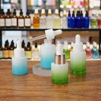 Flacon compte-gouttes cylindrique en verre vert de luxe 20ml 30ml 50ml pour sérum cosmétique avec impression de logo