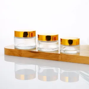 Skin Care Packaging Luxury Eye Facial Cream Round Clear Glass Cream Jar 2 Oz Glass Jars