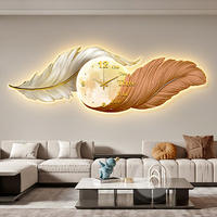 Horloge murale moderne de luxe avec plumes, peinture décorative murale lumineuse pour salon, avec base en papier, pour chambre à coucher, à suspendre au-dessus du lit