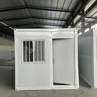Maison modulaire pliable en panneaux sandwich d'acier avec porte de sécurité et trous de ventilation pour le stockage de produits agricoles et de marchandises fraîches