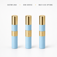 Flacon de parfum vide style stylo fin, bouchon doré et étiquette ornée bleu ciel, vaporisateurs rechargeables en gros avec logo personnalisé