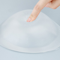 Prothèse mammaire en silicone transparente en forme de goutte d'eau triangulaire OEM/ODM, insert léger pour soutien-gorge, pièce unique