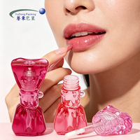 Tube de brillant à lèvres en gros d'usine, contenant vide pour rouge à lèvres liquide, flacon de brillant à lèvres rose, emballage cosmétique créatif avec logo personnalisé