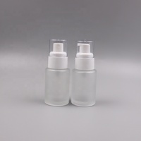 Flacon pompe cosmétique vide en verre dépoli transparent de 30 ml (1 oz) à épaule plate pour lotion corporelle avec couvercle blanc/noir