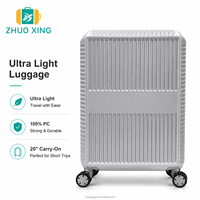 Valise de cabine ultra-légère de 20 pouces en matériau PC, bagage à roulettes portable en aluminium pour les courts séjours.