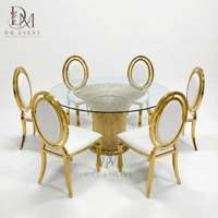 Table de mariage ronde personnalisée en acier inoxydable doré avec base en forme de soleil et plateau en verre trempé miroir