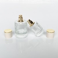 Flacon de parfum en verre transparent OEM 30ml 50ml, cylindre vide, luxe, noir mat, couvercle magnétique, boîte cadeau, vaporisateur à pompe, emballage