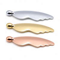 Metall-Gua-Sha-Werkzeug 2-in-1 Doppelkopf-Gesichtsmassagegerät mit Rollkugel für Augenbereich und Hals-Hautpflege