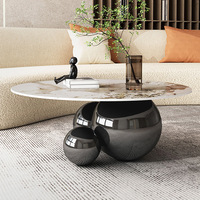 Table basse de luxe moderne en pierre frittée avec cadre en métal doré argenté noir pour mobilier d'hôtel