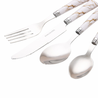 Ensemble de couverts en acier inoxydable avec manche en plastique motif marbre, comprenant couteau à steak, fourchettes à dessert et cuillère de service, 4 pièces