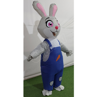 Costume gonflable de lapin de dessin animé mignon, combinaison gonflable de lapin gris pour adulte, salopette bleue à imprimé carotte pour spectacle scénique