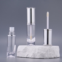 Vente chaude : Tubes à gloss transparents ronds, fabrication directe, logo personnalisé, tubes à gloss injectables, bouteilles en plastique de forme ronde