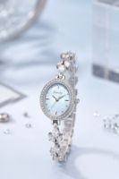 Montre de luxe ovale pour femme avec bracelet en zircon et cadran en nacre, montre tendance pour femme