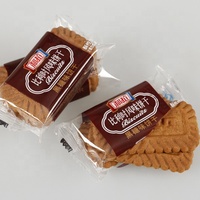 Machine d'emballage et de conditionnement automatique à flux continu pour biscuits, craquelins, gâteaux et autres produits alimentaires