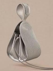 Sac à main tendance pour femme en similicuir avec deux pompons décoratifs, fermeture éclair sécurisée, intérieur spacieux, bandoulière réglable - Product Image 4