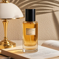 Bouteille de parfum en verre vide de luxe de 50ml avec bouchon de pompe et pulvérisateur à pompe La conception personnalisable unique comprend une boîte