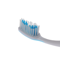 Brosse à dents à poils moyens avec gratte-langue et masseur de gencives pour adultes, vente en gros OEM ODM en vrac directement de l'usine de brosses à dents