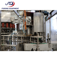 Machine de remplissage automatique de boissons PLC économique pour bouteilles de bière, d'eau et de jus, avec une grande précision