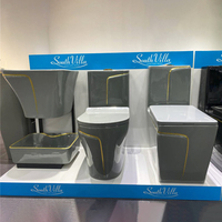 Toilettes modernes grises avec ligne dorée, WC monobloc en céramique colorée, ensemble de toilettes siphoniques en céramique pour la maison et l'hôtel