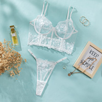 Ensemble de lingerie sexy pour femme avec broderie florale, caraco à baleines, soutien-gorge transparent à trois bretelles et string, vente en gros, personnalisation OEM