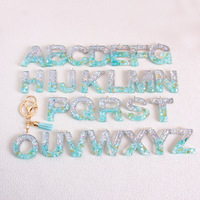 Porte-clés scintillant à 26 lettres avec accents frangés, pendentif en résine en forme de goutte, tendance