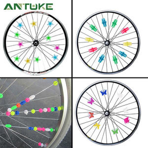 Adornos para radios de bicicleta Antuke, estrellas y mariposas de resina plástica, adornos para bicicletas infantiles de 2 a 4 años - Product Image 1
