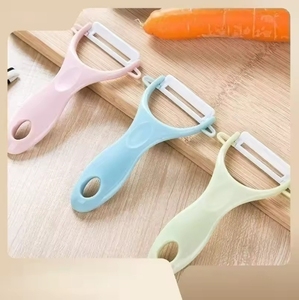 Couteau à éplucher multifonction en céramique, ustensile de cuisine domestique, outil spécialisé pour éplucher les melons - Product Image 1