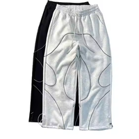 Moda nuevo diseño logotipo personalizado hombres rayas reflectantes pantalones de pierna ancha tejido cargo pantalones de chándal de algodón elástico