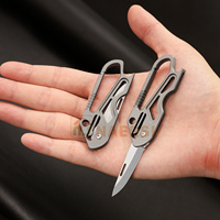 Porte-clés portable couteau pliant multifonctionnel Mini alliage de titane et acier inoxydable avec matériau métallique tranchant