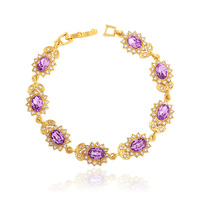 Bracelet en cristal plaqué or, serti de pierres ovales et de fleurs, élégant pour femme, idéal pour mariage, fête ou cadeau.