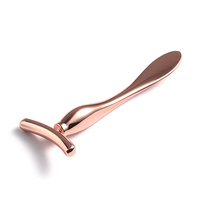 Logo personnalisé en forme de T en métal rouleau de massage des yeux du visage anti-âge rides soins de la peau outils roulants