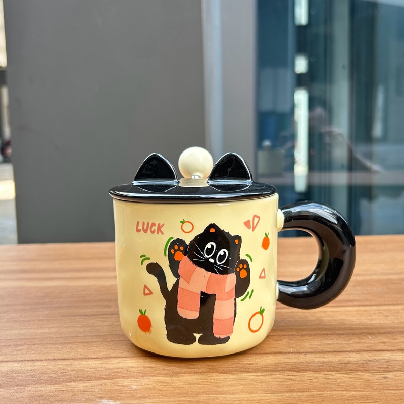 Cuchara de bola con tapa de taza amarilla