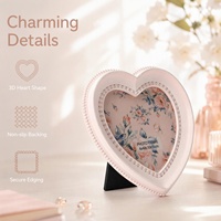 Cadre photo en résine en forme de cœur avec logo personnalisé et emballage de sécurité pour les boutiques de cadeaux et la décoration intérieure