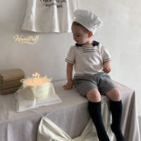 Shorts amples à carreaux avec double bouton décoratif et taille élastique, 98% polyester 2% élasthanne, bas décontractés pour bébés garçons et filles