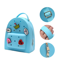 Sac à dos imperméable en silicone pour enfants avec trous décoratifs pour accrocher des breloques, sac d'école tendance pour tout-petits garçons et filles
