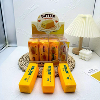 Vente en gros usine : Jouet sensoriel anti-stress à presser, en forme de boule de pudding au caramel et de bloc de construction, avec son croquant et simulation de boulette de maïs, sensation de chaleur