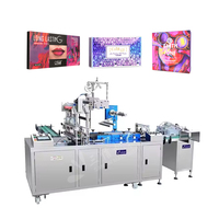 Machine d'emballage sous film transparent pour boîtes de biscuits, boîtes de dentifrice et boîtes de produits de santé