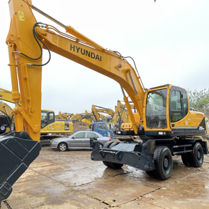 Excavatrice sur pneus d'occasion Hyundai 210W-9T 210, 90% neuve, marque coréenne, robuste, en promotion - Product Image 1